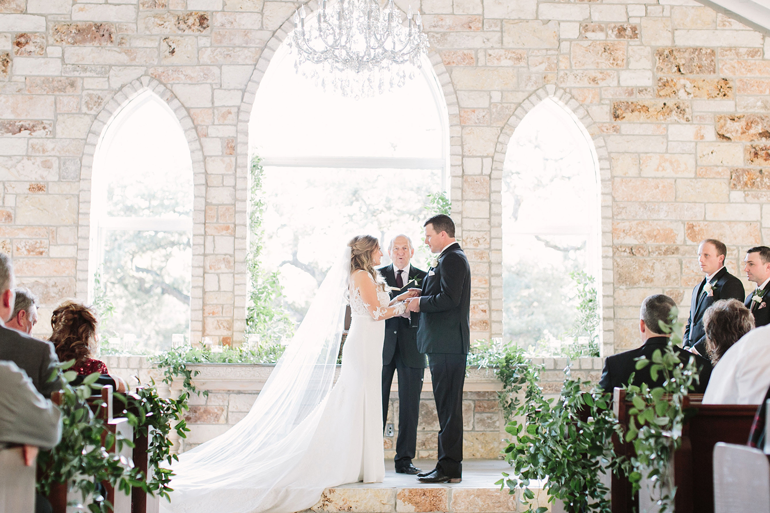 Elevating Your Wedding Day Decor with Your Florals | Reiley and Rose | Central Texas Floral Designer | Chandelier of Gruene | central texas wedding venue, wedding inspiration, floral inspiration, wedding decor, ceremony space decor, greenery wedding decor | via reileyandrose.com