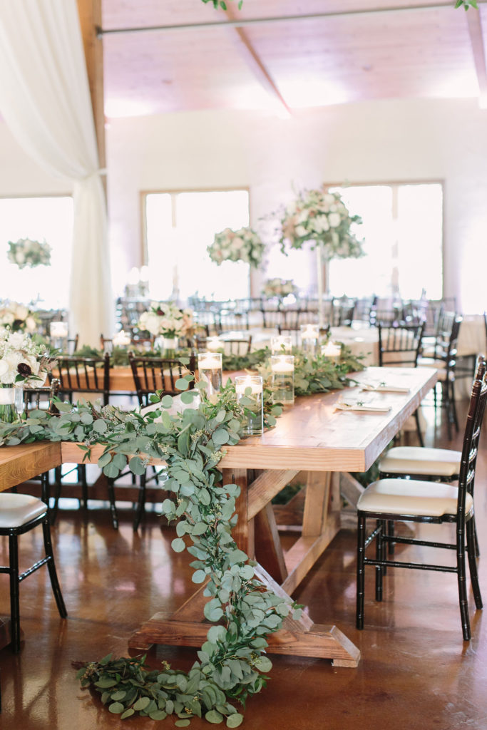 Elevating Your Wedding Day Decor with Your Florals | Reiley and Rose | Central Texas Floral Designer | Chandelier of Gruene | central texas wedding venue, wedding inspiration, floral inspiration, wedding decor, centerpieces, tall centerpieces, compote centerpieces, candle centerpieces | via reileyandrose.com