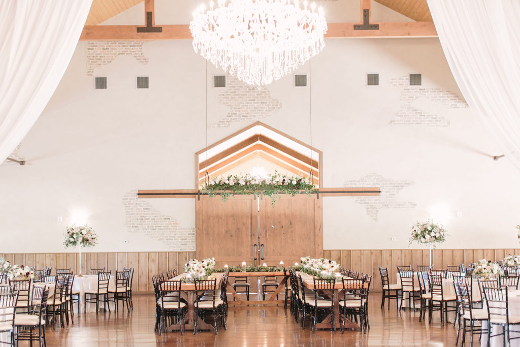 Elevating Your Wedding Day Decor with Your Florals | Reiley and Rose | Central Texas Floral Designer | Chandelier of Gruene | central texas wedding venue, wedding inspiration, floral inspiration, wedding decor, hanging florals, floral boxes, reception space decor | via reileyandrose.com