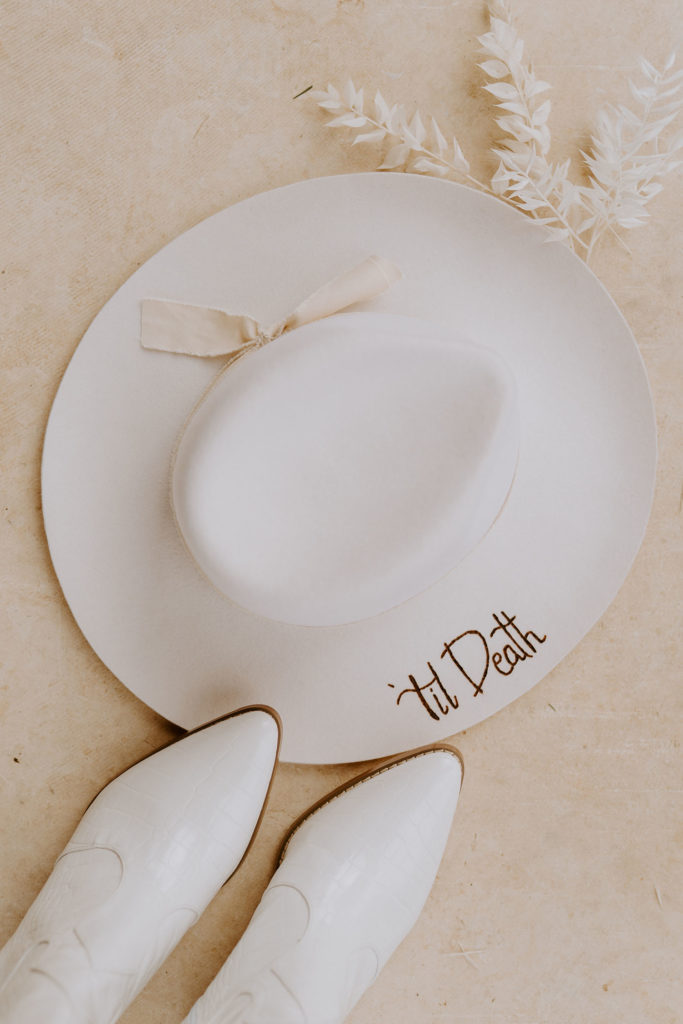 Bridal Hat with Wedding Date | Reiley and Rose | Central Texas Floral Designer | terracotta wedding inspiration, ideas for rust wedding, wedding day ideas | via reileyandrose.com