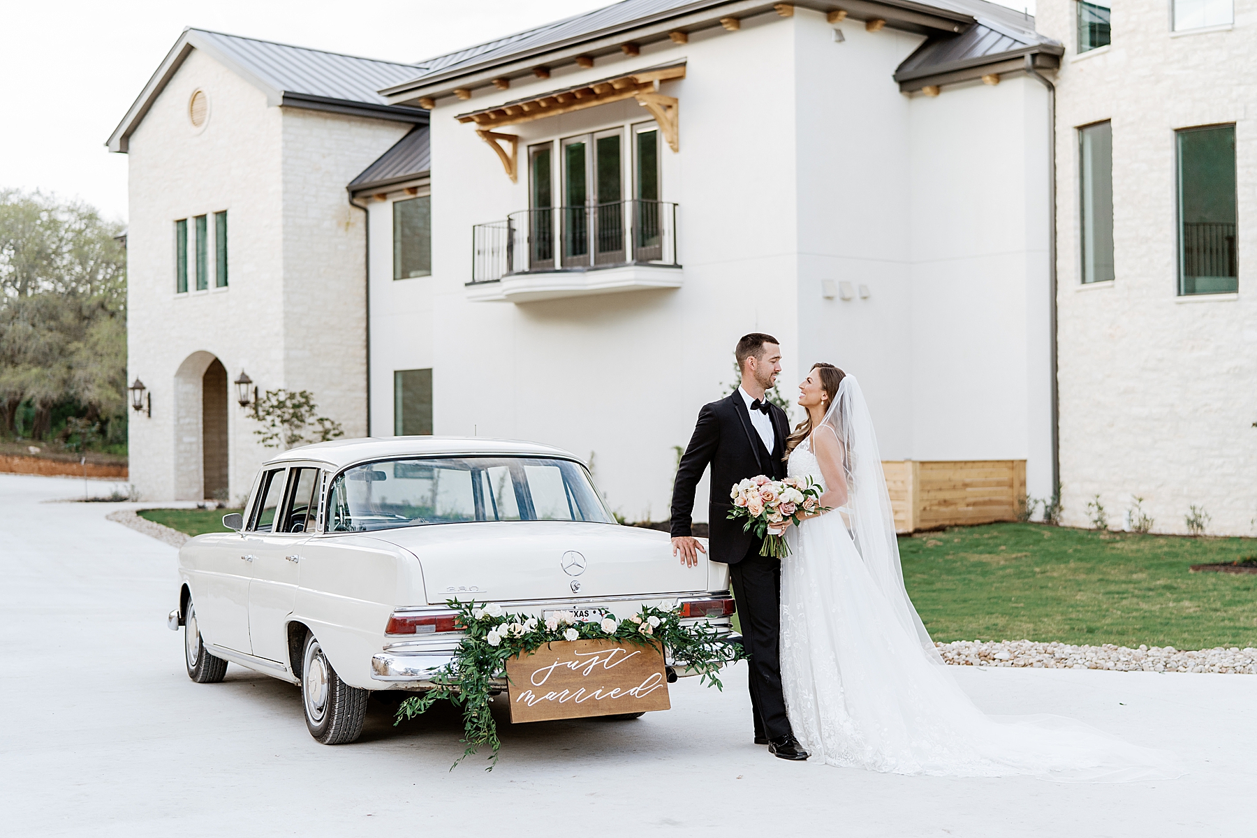 Couples portraits with vintage car at Hill Country wedding venue | Reiley and Rose | Central Texas Wedding Floral Designer | The Preserve at Canyon Lake Wedding Venue | classic wedding inspiration, chic wedding, pink wedding color scheme | via reileyandrose.com