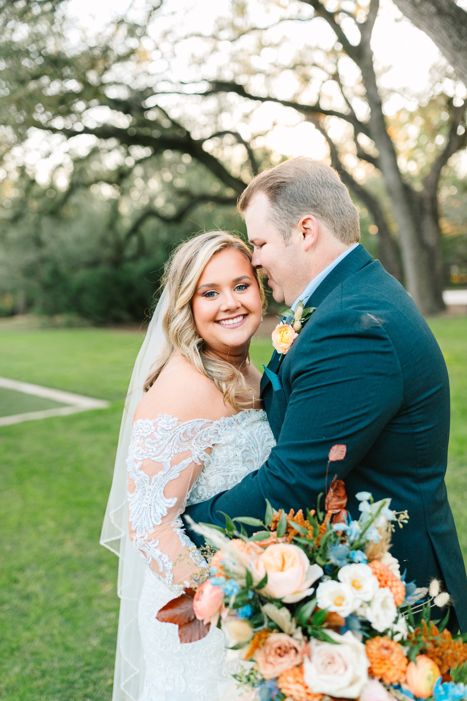 Bold and colorful wedding day with velvet bridesmaids dress at the Chandelier of Gruene in New Braunfels, TX | Reiley + Rose