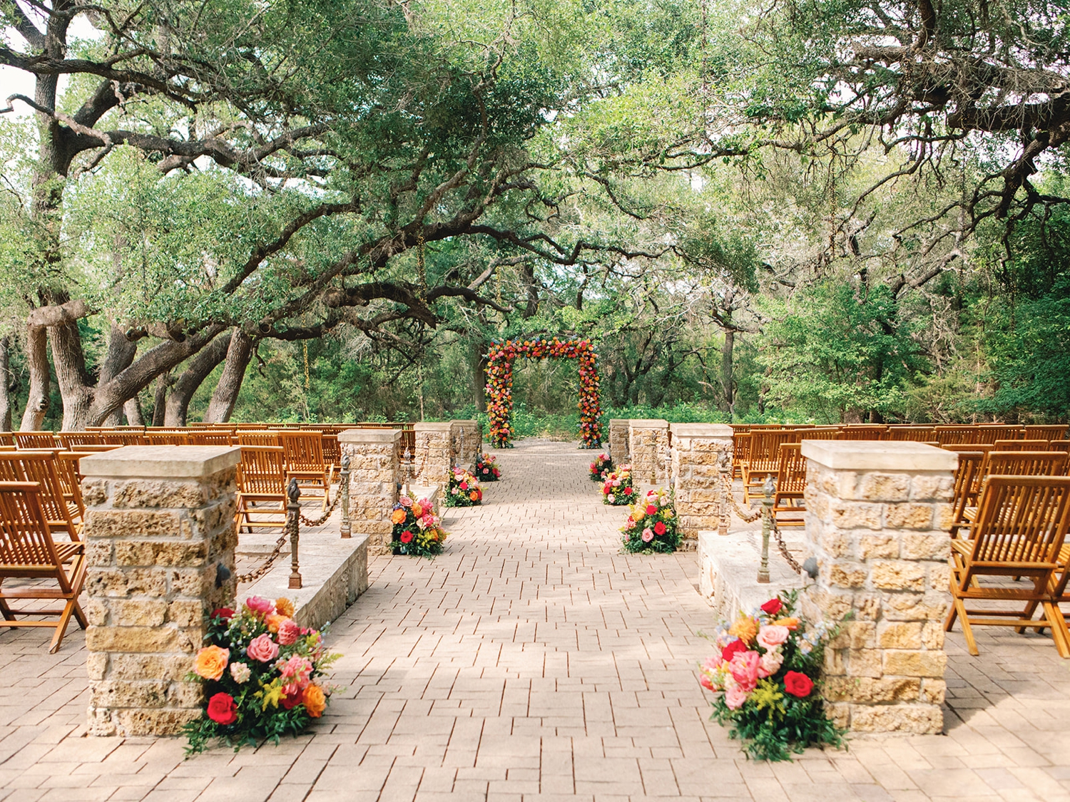Wedding Ceremony Space with Floral Arch and Aisle Arrangements | Central Texas Floral Designer | Reiley and Rose
