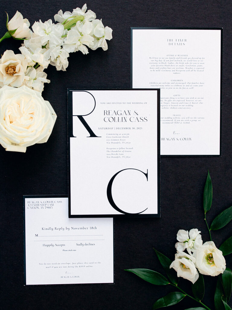 invitation flat lay  | Chandelier of Gruene Wedding | Modern Black and White Chic Wedding | 