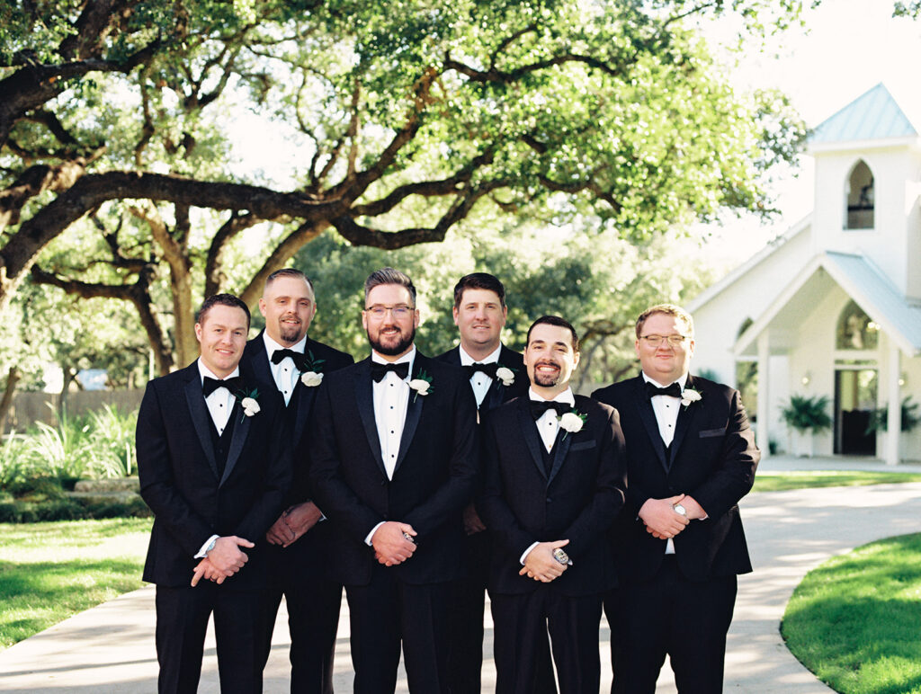 groom and groomsmen | Chandelier of Gruene Wedding | Modern Black and White Chic Wedding | 