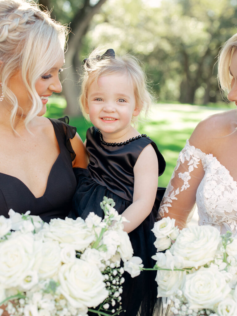 flowergirl and bridesmaid  | Chandelier of Gruene Wedding | Modern Black and White Chic Wedding | 