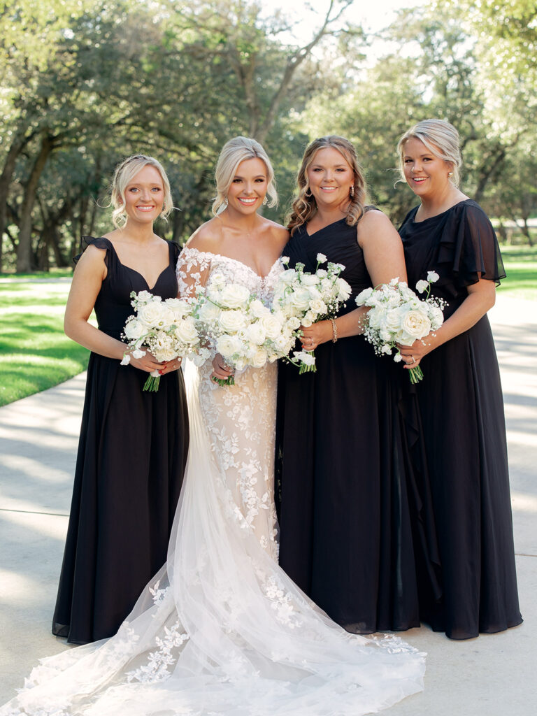 bride and bridesmaids  | Chandelier of Gruene Wedding | Modern Black and White Chic Wedding | 