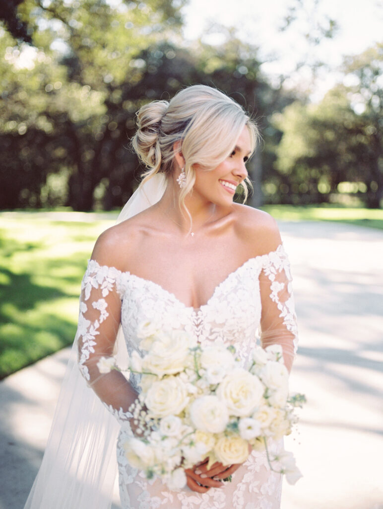 bride with bouquet  | Chandelier of Gruene Wedding | Modern Black and White Chic Wedding | 