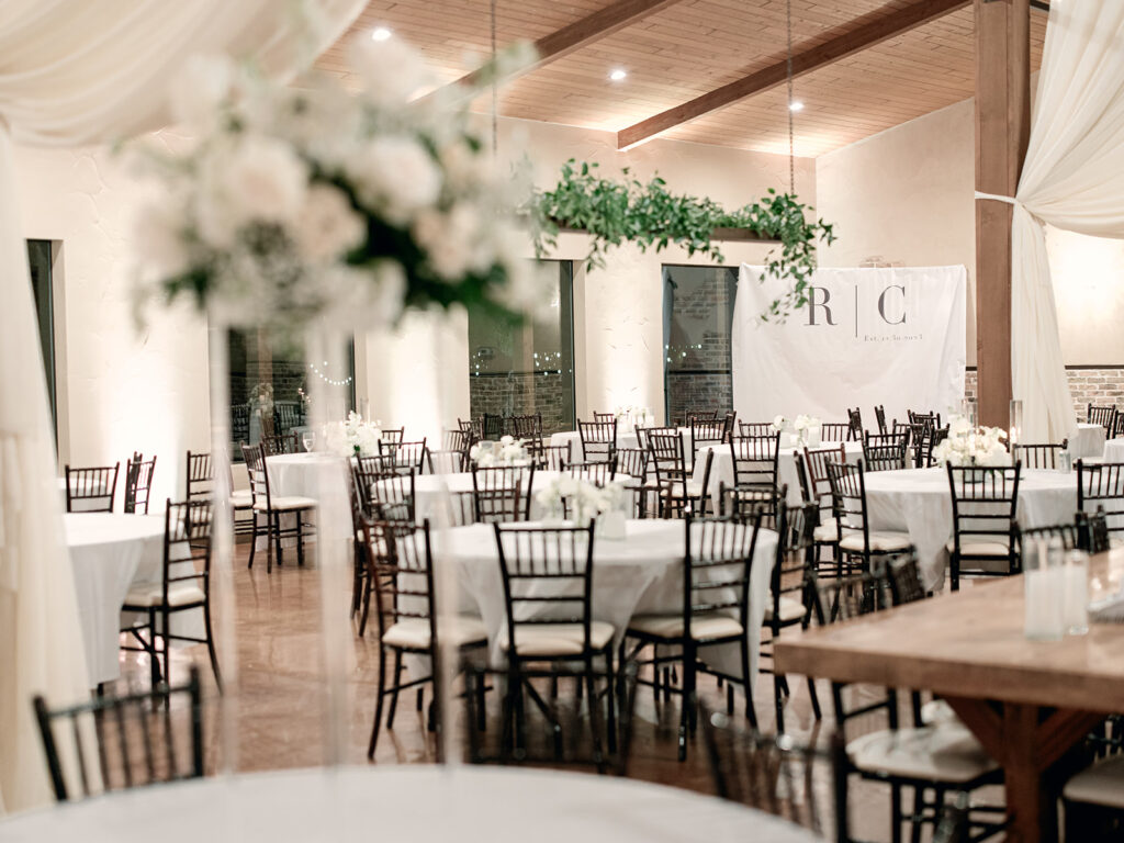 room shot of chandelier  | Chandelier of Gruene Wedding | Modern Black and White Chic Wedding | 