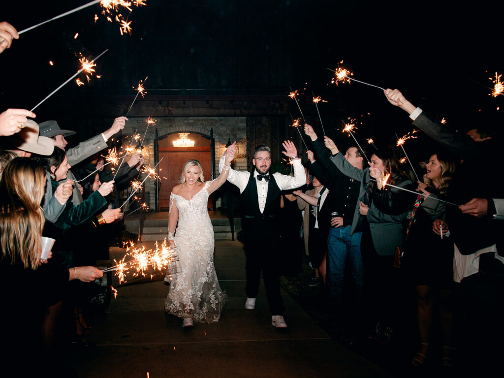 bride and groom sparkler exit | Chandelier of Gruene Wedding | Modern Black and White Chic Wedding | 