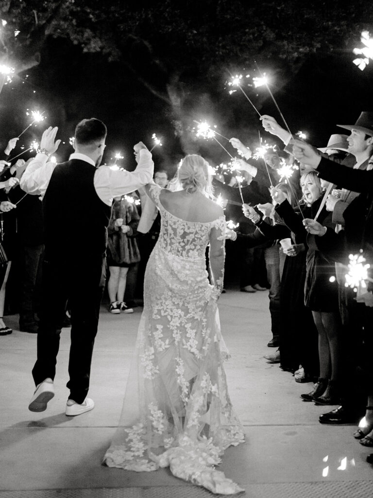 bride and groom sparkler exit | Chandelier of Gruene Wedding | Modern Black and White Chic Wedding | 