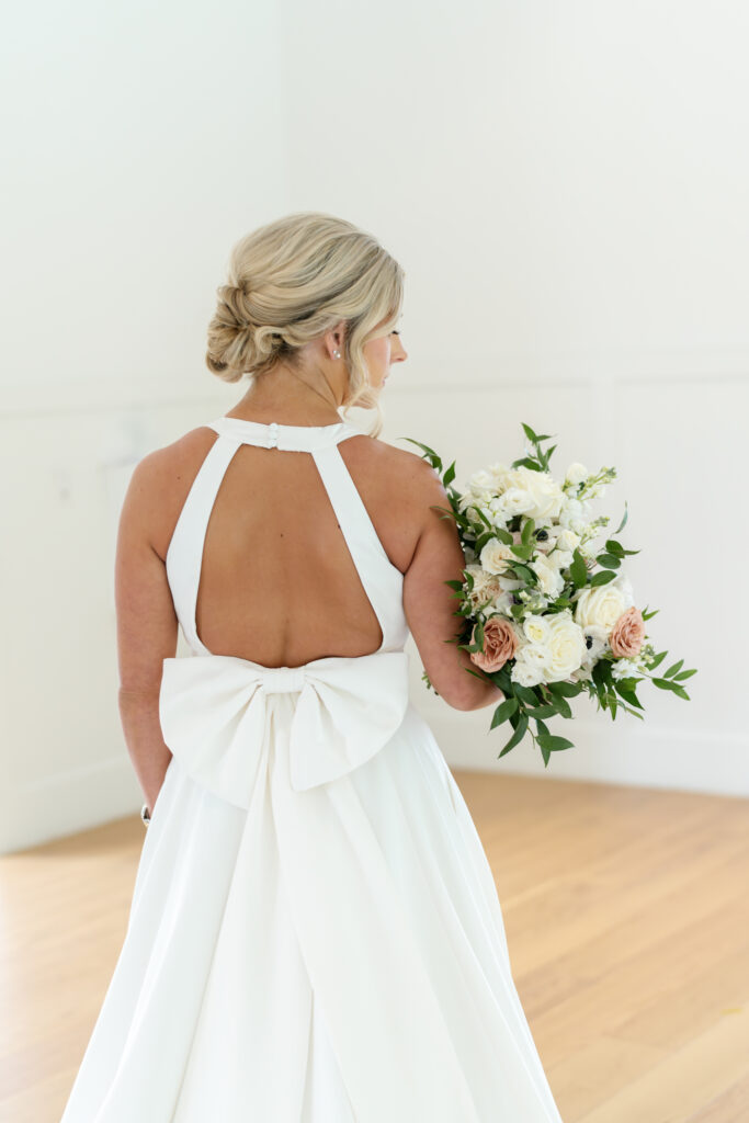 bride with bow dress
wedding planner
why you need to hire a wedding planner