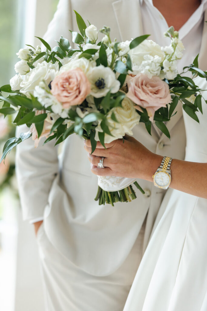 bridal bouquet with rolex watch and ring
wedding planner