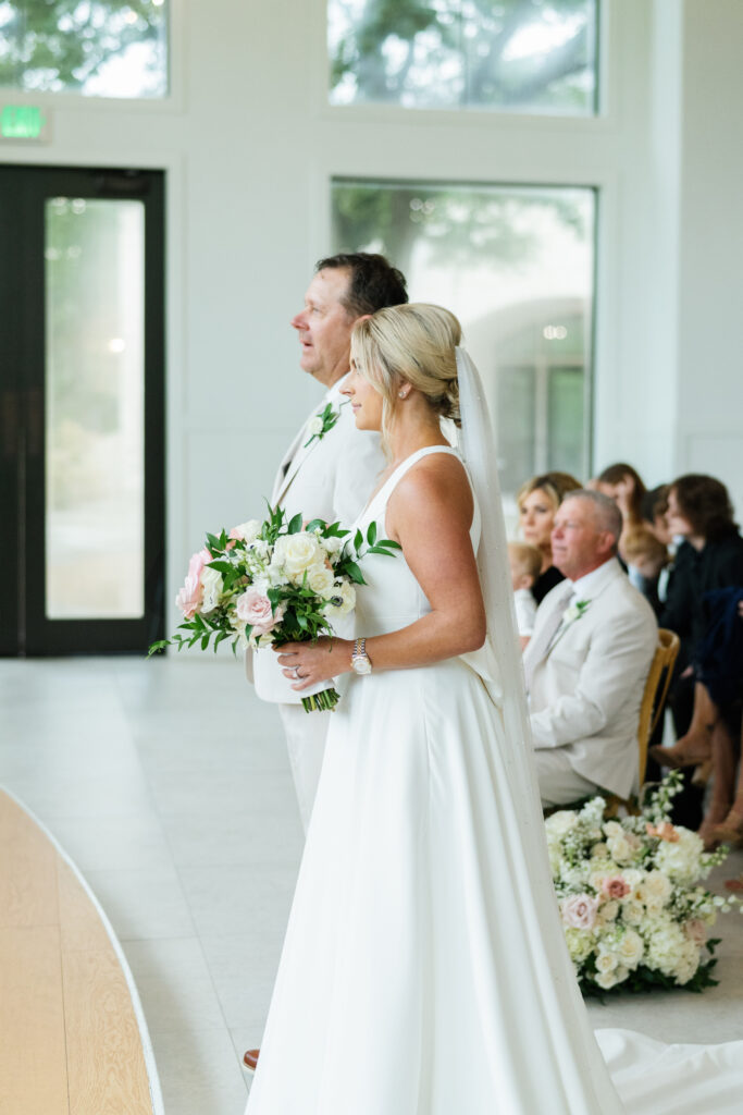 bride and dad at the altar during ceremony