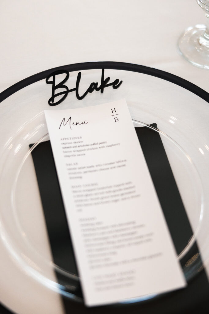 name with menu card and charger plate