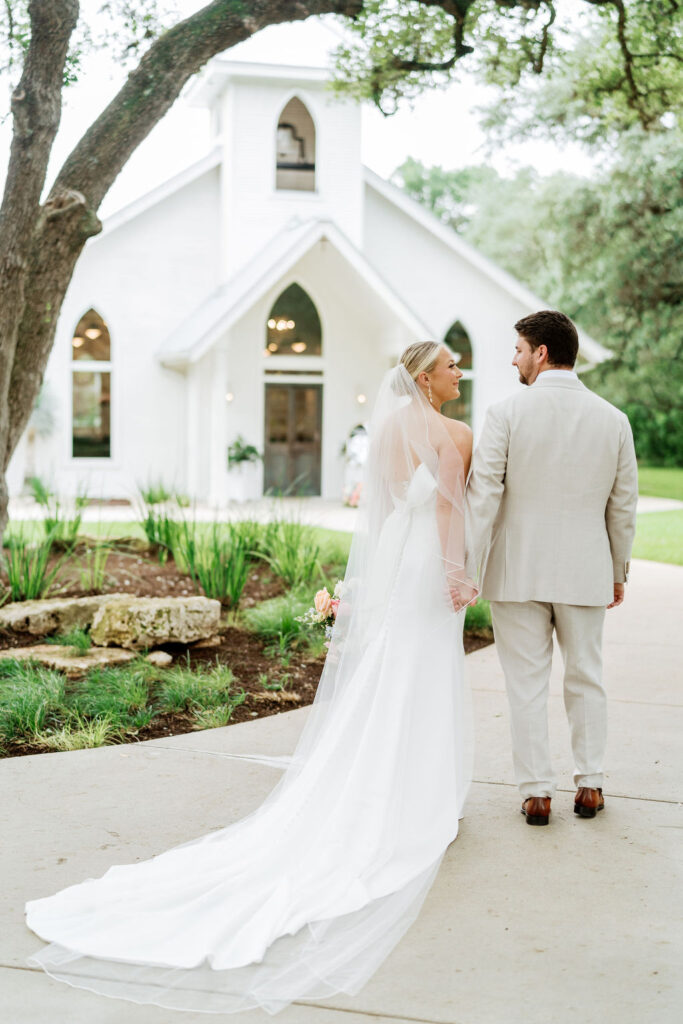 colorful gruene wedding bride and groom white chapel
