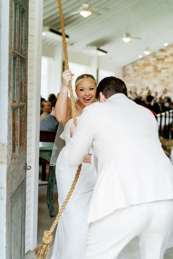 bride ringing the bell
