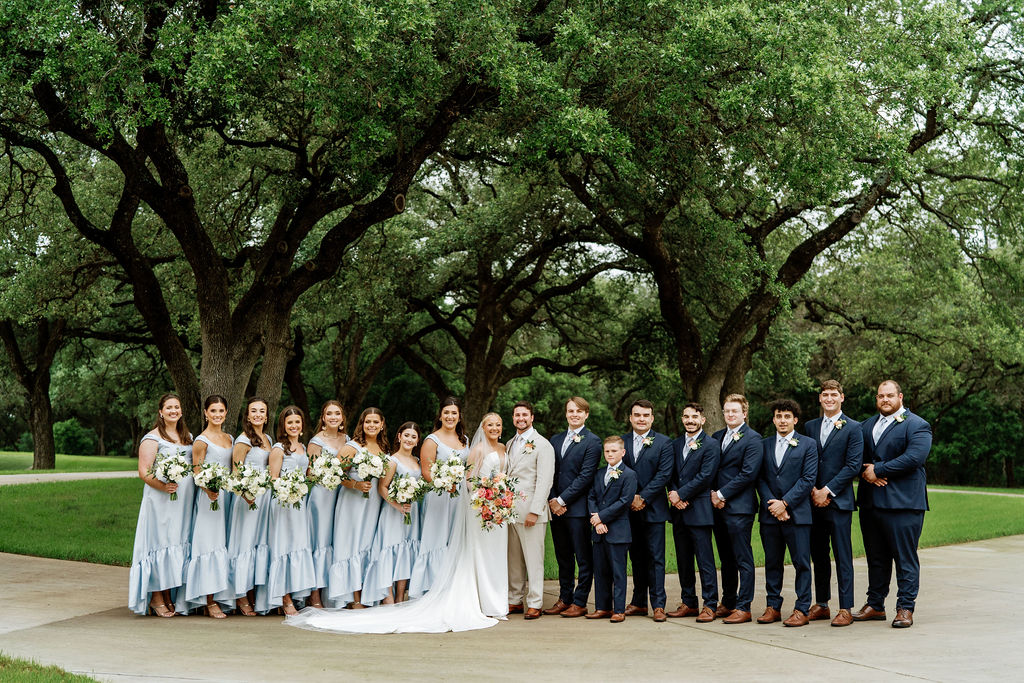 colorful gruene wedding the chandelier of gruene bridal party
