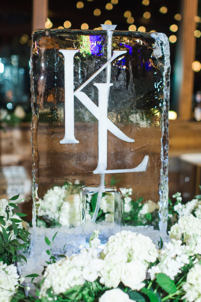 monogram ice luge floral filled wedding