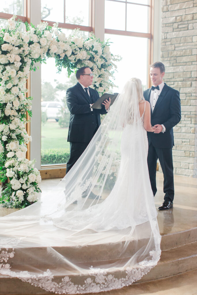 bride and groom at the alter
