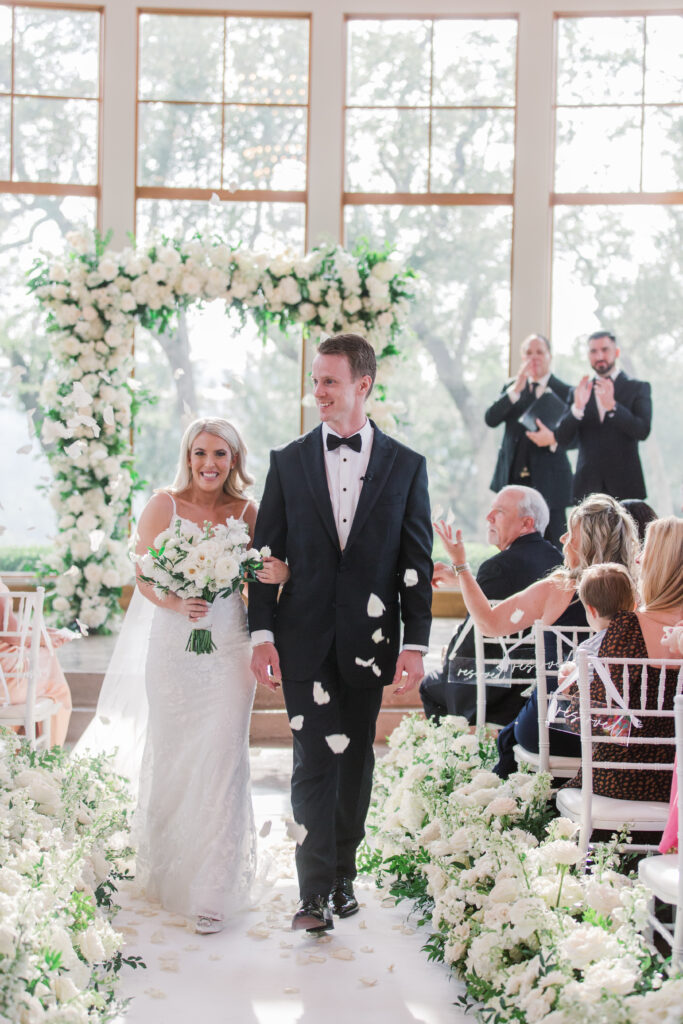 bride and groom floral filled chapel
floral filled wedding