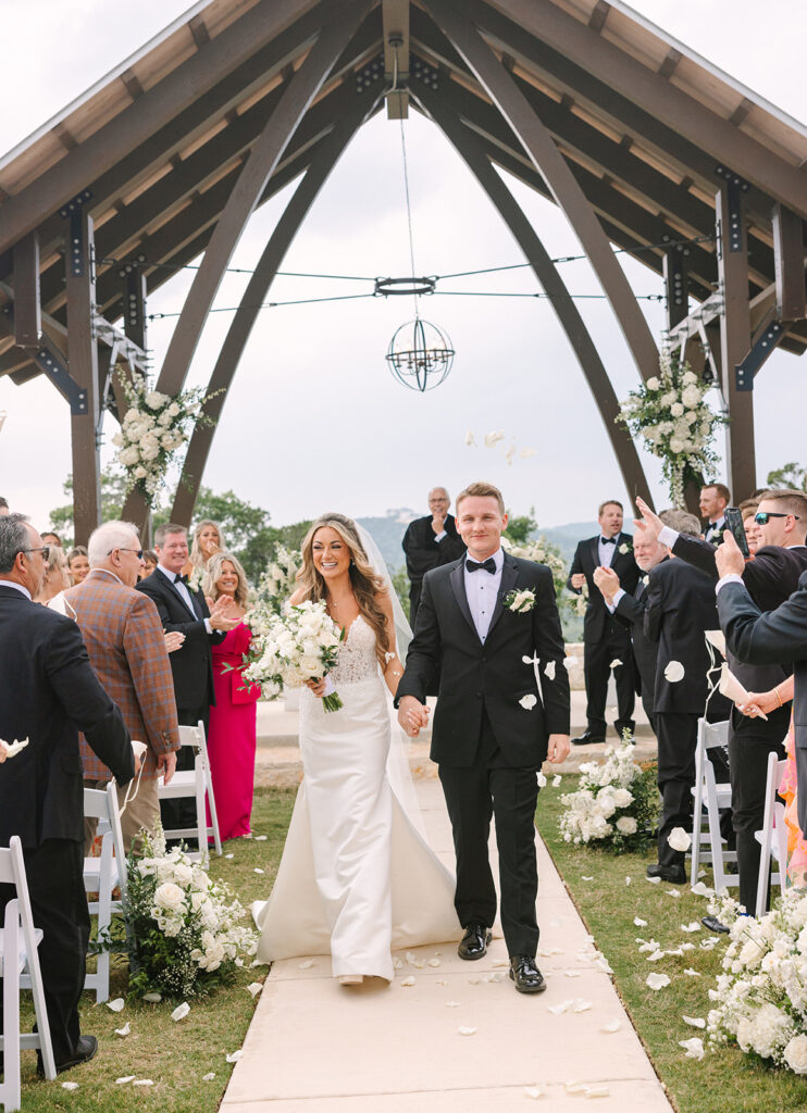 bride and groom after ceremony Spring Hill Country Wedding Day
