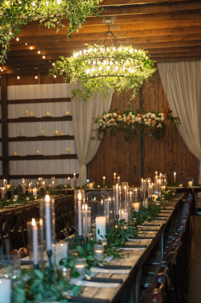 Fall Wedding at The Allen Farmhaus, long tables with candles, greenery chandeliers