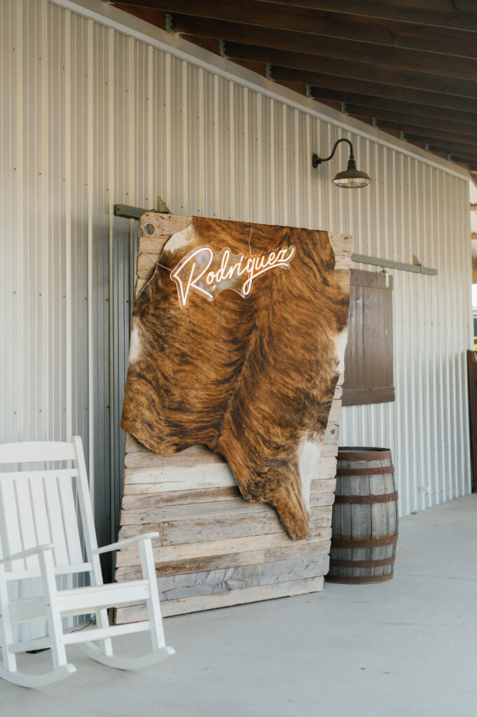 Fall Wedding at The Allen Farmhaus, cowhide neon sign