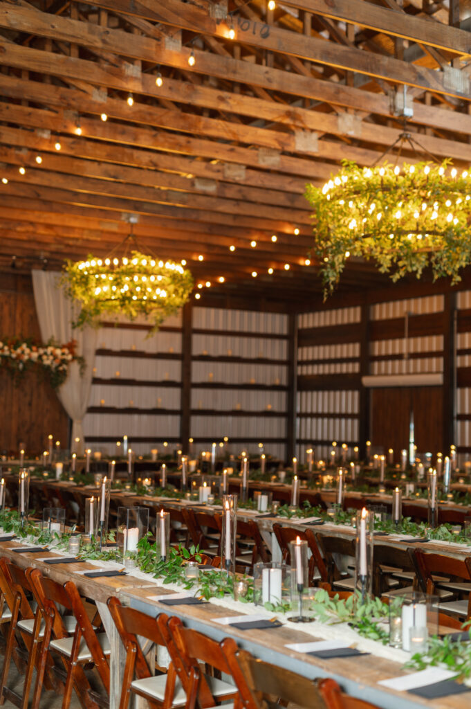 hjanging floral installation, greenery on chandeliers, Fall Wedding at The Allen Farmhaus