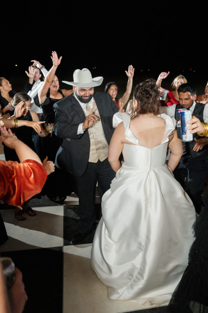 bride and groom dancing