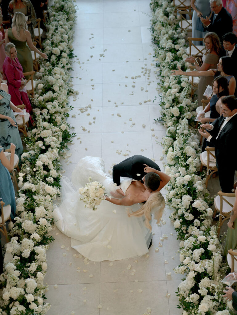 Bride and groom sharing a kiss just after getting married