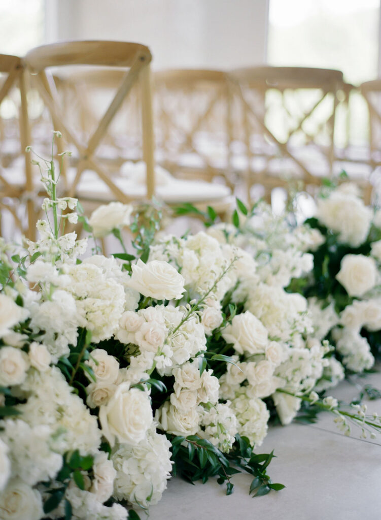 Our team had the best time creating these wedding day flowers for the aisle