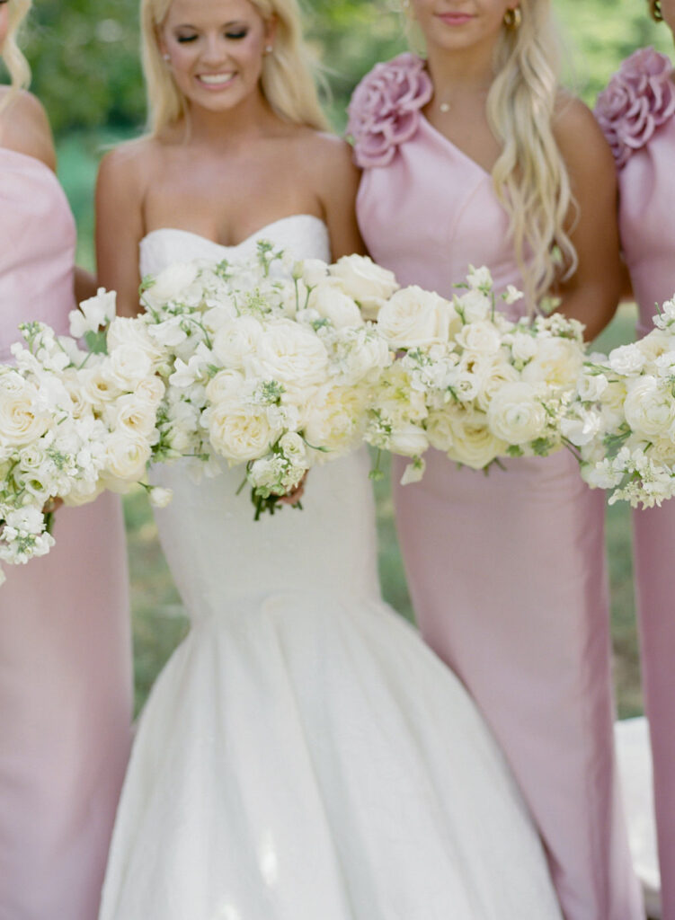 Bridal party with white bouquets