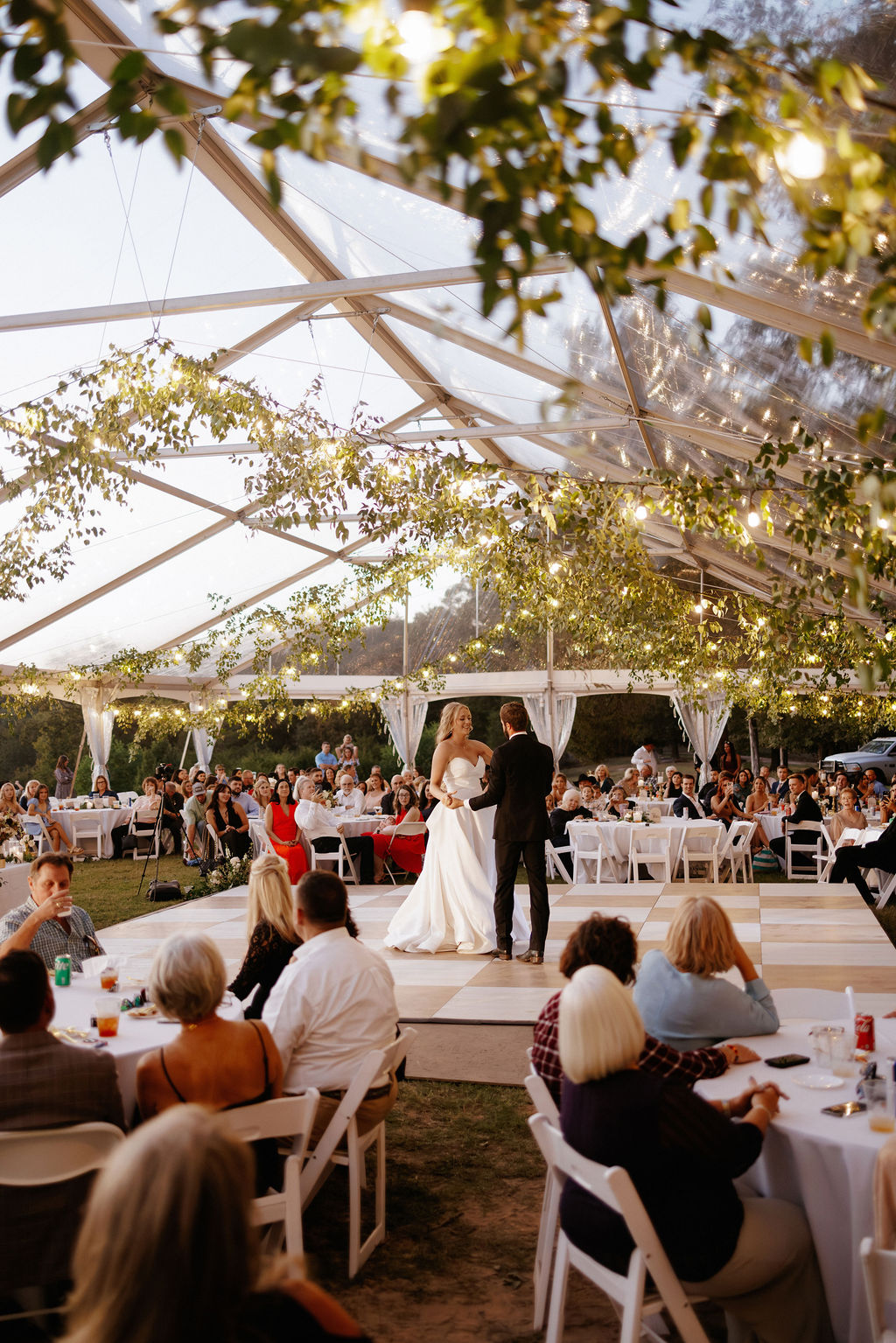 When wedding floral design inspiration comes to life - hanging tent greenery
