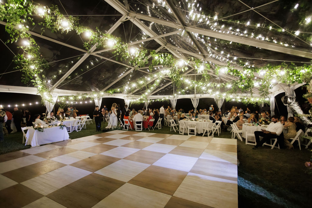 Hanging greenery in this tent was the perfect touch for the wedding floral design