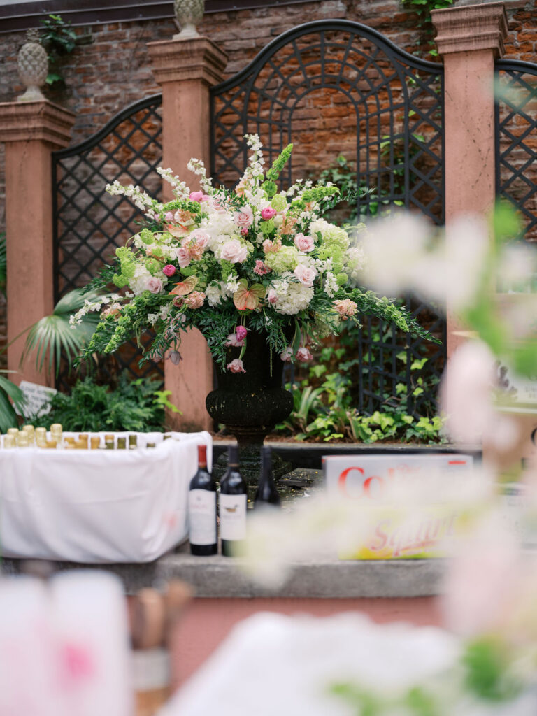 Fountain at Brennan's in New Orleans adorned with the most beautiful wedding flowers