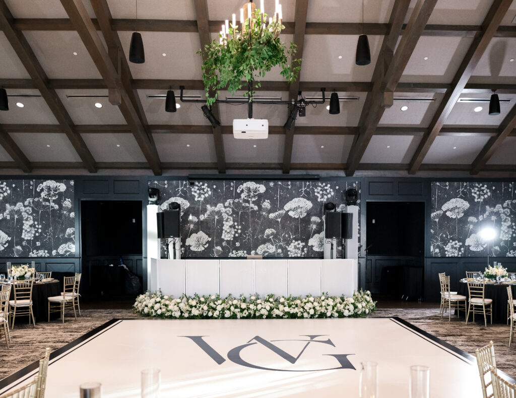 Stage floral installation due to room in the wedding floral budget