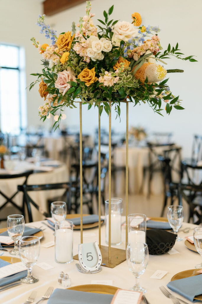 Fall centerpiece on tall gold stand