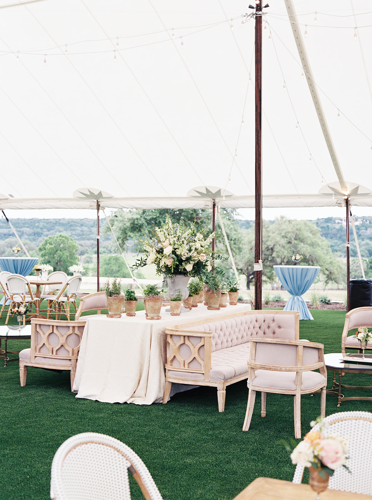 Tent florals at a Hill Country wedding venue
